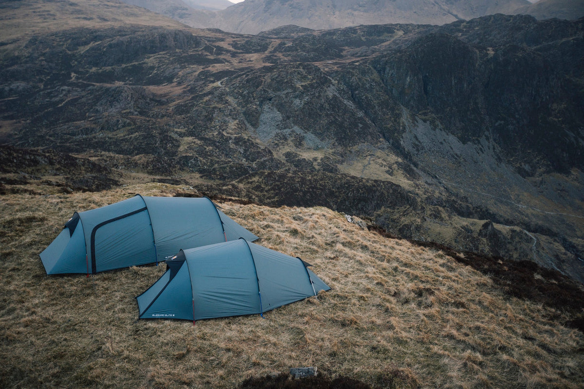 A tent pitched high in the mountains